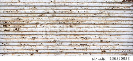 Rusty metal shutter showing weathered texture and aging Rusty metal shutter showing weathered texture and aging 136820928