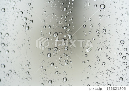 Rain drops on window glass 136821806