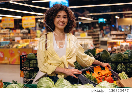 Gorgeous woman is in the grocery store Gorgeous woman is in the grocery store 136823477