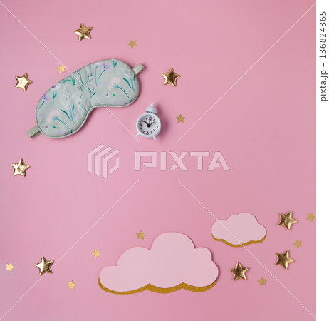 World Sleep Day concept. Bedtime accessories, sleeping mask, white classic alarm clock on pastel pink background World Sleep Day concept. Bedtime accessories, sleeping mask, white classic alarm clock on pastel pink background 136824365