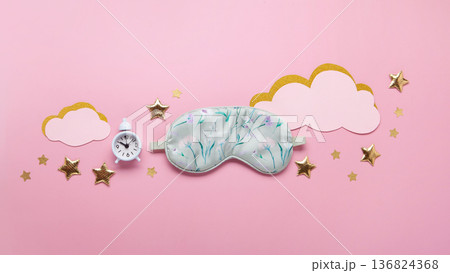 World Sleep Day concept. Bedtime accessories, sleeping mask, white classic alarm clock on pastel pink background World Sleep Day concept. Bedtime accessories, sleeping mask, white classic alarm clock on pastel pink background 136824368