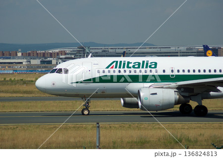 Frankfurt, Germany, July 09 2017: Italian Airbus A320 Taxiing Past Spotting Point Toward Runway 136824813