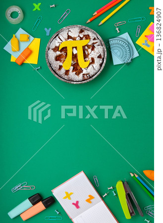 International World Pi day. Homemade apple pie with Pi Symbol and stationery, green background.  March 14th 3,14. Mathematical constant. 136824907
