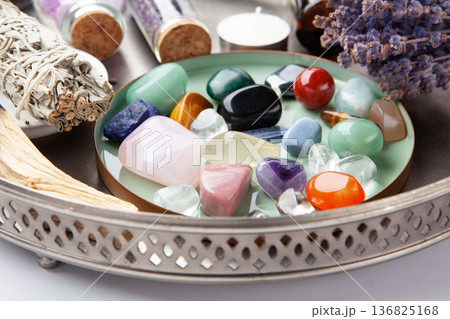 Chakra Crystal Healing Ritual With Lavender Palo Santo White Sage Essential Oils And Candles On White Marble Background 136825168