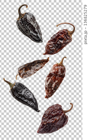 Dried chili peppers scattered and isolated on white background, spicy food concept, showcasing culinary ingredients texture Dried chili peppers scattered and isolated on white background, spicy food concept, showcasing culinary ingredients texture 136825279