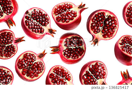 Multiple fresh red pomegranates with water droplets in a seamless pattern, isolated on a white background, concept of freshness 136825417