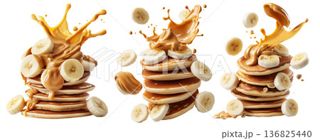 Stack of pancakes topped with banana slices and peanut butter splash isolated on white transparent background Stack of pancakes topped with banana slices and peanut butter splash isolated on white transparent background 136825440