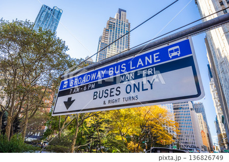 Broadway bus lane sign with buses only restriction above Manhattan street in New York City Broadway bus lane sign with buses only restriction above Manhattan street in New York City 136826749