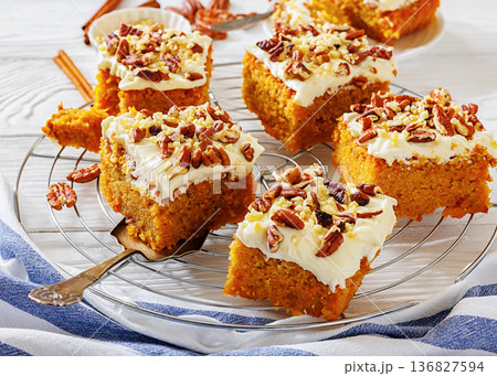 Carrot cake squares with cream cheese and pecan Carrot cake squares with cream cheese and pecan 136827594