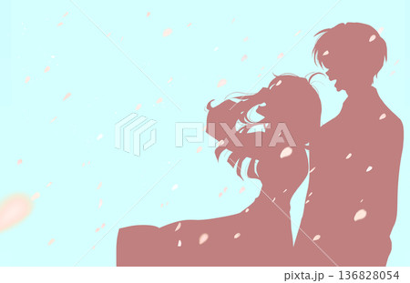 隣り合って笑う男女　髪を押さえる　シルエット　桜吹雪 136828054