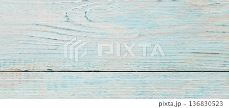 Weathered wooden planks texture with light blue and peach paint in horizontal format Weathered wooden planks texture with light blue and peach paint in horizontal format 136830523