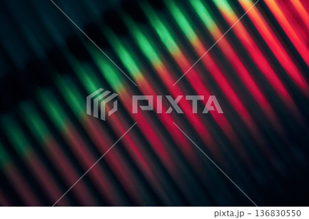 Diagonal light lines forming an abstract pattern on Blurred ribbed glass 136830550