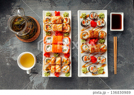 Assorted sushi rolls set with soy sauce 136830989
