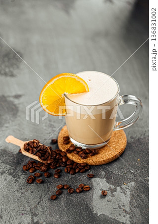 Coffee with orange slice on glass mug 136831002