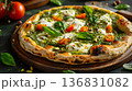 Gourmet pizza with vibrant matcha crust and juicy tomatoes styled on black backdrop, modern food photography 136831082