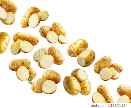 Fresh raw potatoes with skin, scattered and isolated on white background, concept of organic food ingredients 136831124