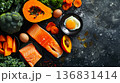 Colorful natural sources of vitamin A contrasted against black backdrop, wholesome diet idea 136831414