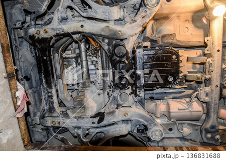 View of the car from below. Autoservice center. Car maintenance. View of the car from below. Autoservice center. Car maintenance. 136831688