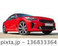 Red car on white background. Stylish, modern, bright image of the car for design solutions. 136833364