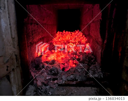 Coal Heat in a Furnace Creates a Bright Glow in the Combustion Chamber Coal Heat in a Furnace Creates a Bright Glow in the Combustion Chamber 136834013