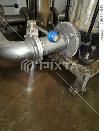 Water Leakage Observed From Butterfly Faucet in an Industrial Setting During Daytime Water Leakage Observed From Butterfly Faucet in an Industrial Setting During Daytime 136834042