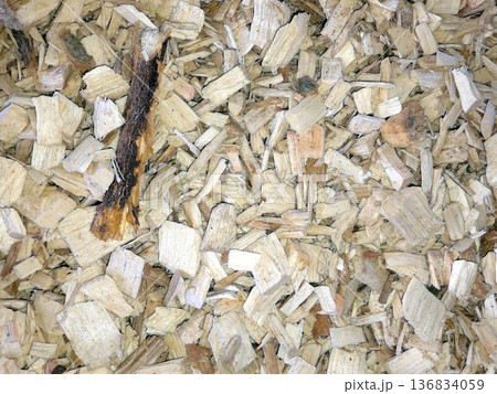 Wood Chips Scattered on a Surface in a Natural Setting During Daylight Hours Wood Chips Scattered on a Surface in a Natural Setting During Daylight Hours 136834059