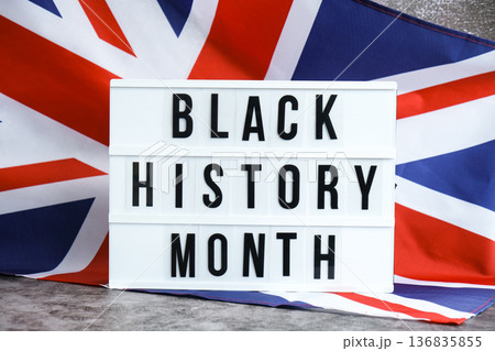 BLACK HISTORY MONTH patriotic scene with signboard and waving flag message AUSTRALIA with national colors Festive with Aussie flag and message board with text AUSTRALIA BLACK HISTORY MONTH patriotic scene with signboard and waving flag message AUSTRALIA with national colors Festive with Aussie flag and message board with text AUSTRALIA 136835855
