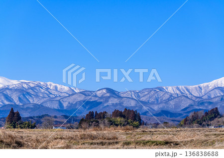 雪の蔵王と青空と春を待つ里山 雪の蔵王と青空と春を待つ里山 136838688