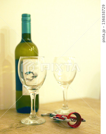 Wine and Glasses on a Wooden Table Wine and Glasses on a Wooden Table 136838729