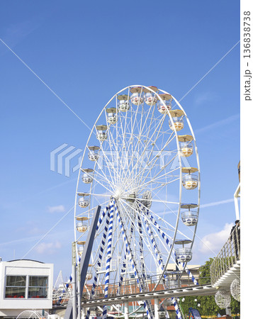 Giant Ferris Wheel Over Sunny Pier 136838738