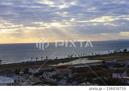 Sunlit Coastal Town at Golden Hour Sunlit Coastal Town at Golden Hour 136838739