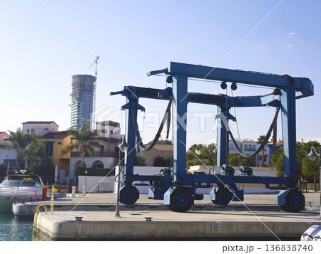 Large Blue Travel Lift at Marina Dock 136838740