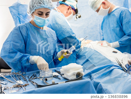 Surgery to remove the breast and replace it with an implant. 136838896