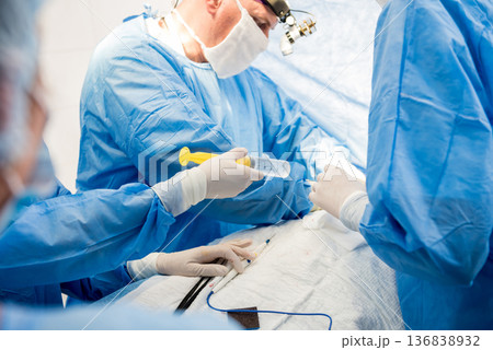 Surgery to remove the breast and replace it with an implant. 136838932