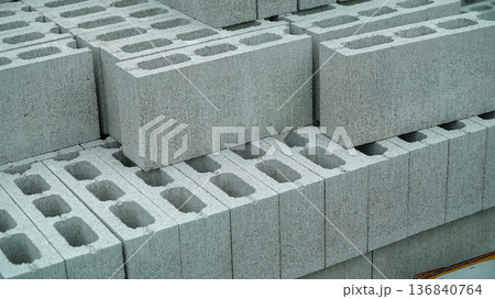 Stacked Cement Blocks with Holes for Construction 136840764