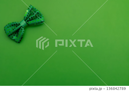 Beautiful table setting for St. Patricks Day celebration on green background 136842789