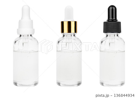 Glass bottle with cuticle oil and facial serum isolated on white background 136844934
