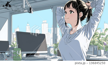 仕事の合間にストレッチ（伸び）をする女性