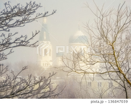Cathedral with blue domes during winter In a frosty sunny haze Cathedral with blue domes during winter In a frosty sunny haze 136847039