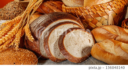 Fresh baked bread. Assorted bakery products loafs of bread and rolls... Fresh baked bread. Assorted bakery products loafs of bread and rolls... 136848140