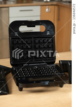 Electric waffle iron for making Viennese and Belgian waffles Electric waffle iron for making Viennese and Belgian waffles 136848572