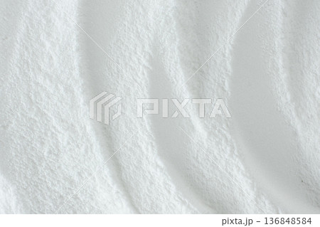 Soda powder sodium bicarbonate surface. Abstract white background. White texture with wavy patterns top view 136848584
