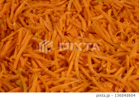 Close up of bright orange carrot julienne top view 136848604