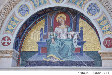 Saint Reparata, colourful mosaic by Giuseppe Modena da Lucca, lunette above left door of Cathedral in Pisa, Italy. Unesco World Heritage Site. 136850751