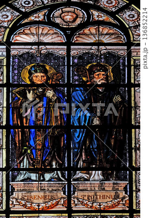 Saint Irenaeus and Saint Pothinus, stained glass window in the Saint Augustine church in Paris, France Saint Irenaeus and Saint Pothinus, stained glass window in the Saint Augustine church in Paris, France 136852214