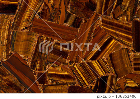 Tigers Eye Golden exclusive semi-precious stone texture, perfect background as part of your interior art work. 136852406