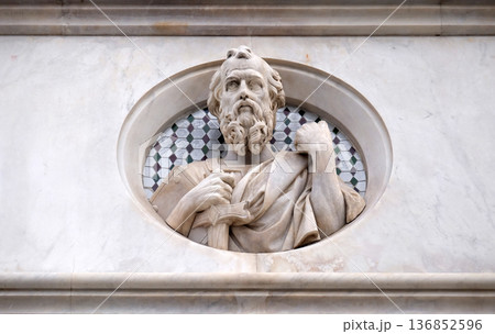 Saint, relief on the facade of Basilica di Santa Croce (Basilica of the Holy Cross) - famous Franciscan church in Florence, Italy Saint, relief on the facade of Basilica di Santa Croce (Basilica of the Holy Cross) - famous Franciscan church in Florence, Italy 136852596