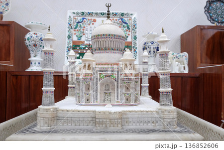 Marble replica of the world famous Taj Mahal, exhibited in a souvenir shop in Agra, Uttar Pradesh, India Marble replica of the world famous Taj Mahal, exhibited in a souvenir shop in Agra, Uttar Pradesh, India 136852606