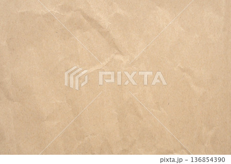 Abstract crumpled and creased recycle brown paper texture background Abstract crumpled and creased recycle brown paper texture background 136854390