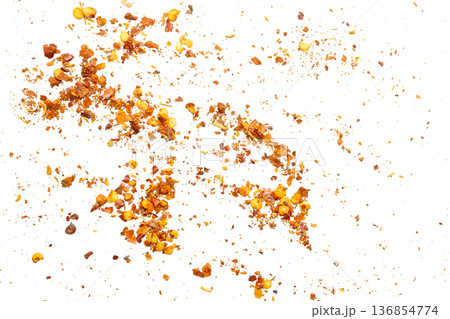 dried red chili pepper flakes and seeds isolated on white background 136854774
